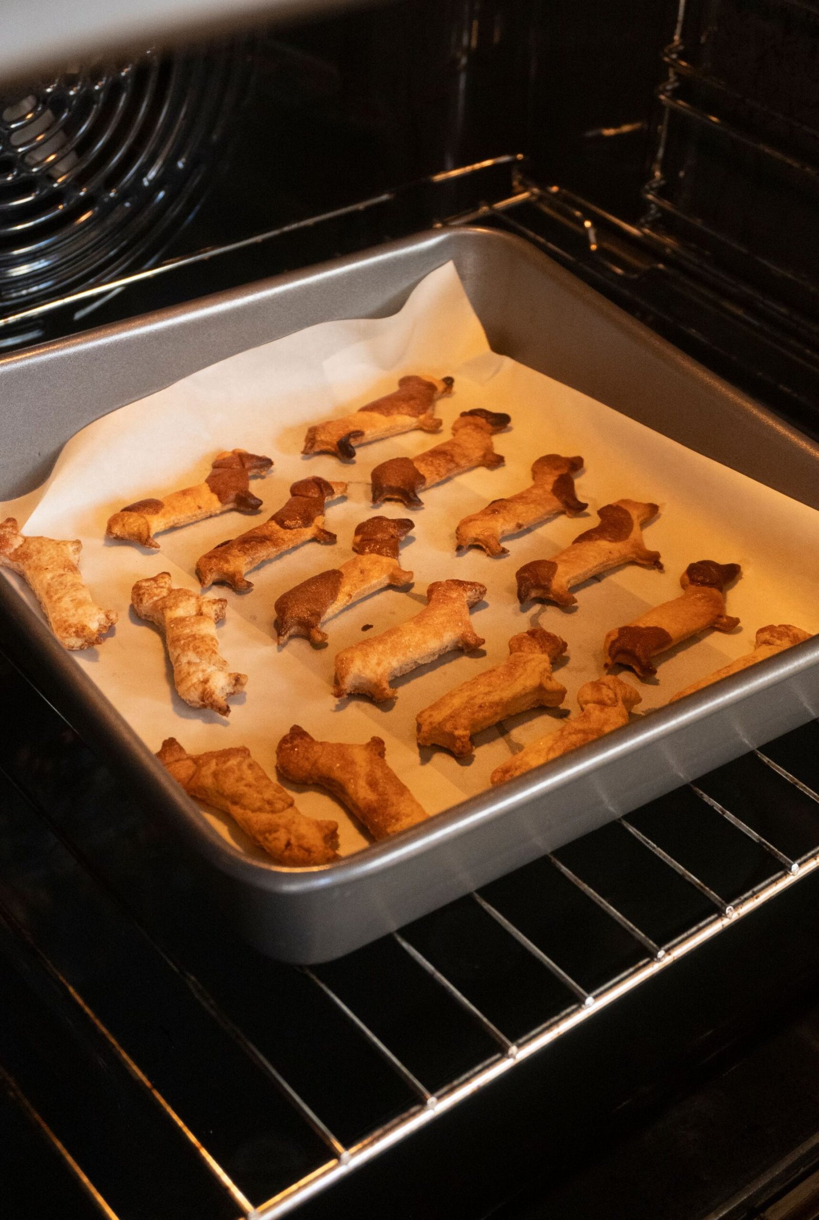 Homemade dog biscuits baking in the oven